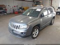 2014 Jeep Compass — photo 2 of 12 | VIN 1C4NJDBB8ED623813