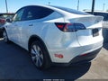 2023 Tesla Model Y — photo 3 of 21 | VIN 7SAYGDEE4PA117134