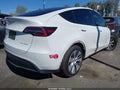 2023 Tesla Model Y — photo 4 of 21 | VIN 7SAYGDEE4PA117134
