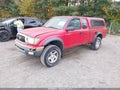 2002 Toyota Tacoma — photo 2 of 11 | VIN 5TEWM72N92Z026017