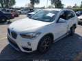2018 BMW X1 — photo 2 of 18 | VIN WBXHU7C30J5H41295