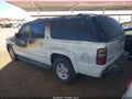 2004 Chevrolet Suburban 1500 — photo 3 of 11 | VIN 1GNFK16Z34J165290