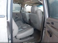 2004 Chevrolet Suburban 1500 — photo 8 of 11 | VIN 1GNFK16Z34J165290