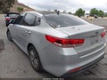 2016 Kia Optima — photo 3 of 11 | VIN 5XXGT4L18GG001178
