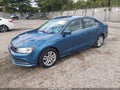 2017 Volkswagen Jetta — photo 2 of 13 | VIN 3VW2B7AJ4HM342737