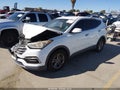 2017 Hyundai Santa Fe — photo 2 of 16 | VIN 5XYZTDLB8HG382741
