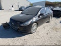 2018 Hyundai Accent — photo 2 of 16 | VIN 3KPC24A39JE019968