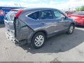 2015 Honda CR-V — photo 4 of 19 | VIN 5J6RM4H70FL105451