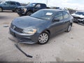 2015 Volkswagen Jetta — photo 2 of 16 | VIN 3VW1K7AJ1FM345622