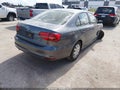 2015 Volkswagen Jetta — photo 4 of 16 | VIN 3VW1K7AJ1FM345622
