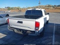 2021 Toyota Tacoma — photo 4 of 15 | VIN 3TYAX5GN9MT013142