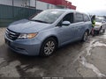 2014 Honda Odyssey — photo 2 of 16 | VIN 5FNRL5H69EB022012
