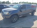 2014 Toyota Tacoma — photo 2 of 16 | VIN 5TFJU4GN1EX061776