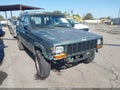 2000 Jeep Cherokee — photo 1 of 12 | VIN 1J4FT28S1YL129243