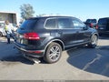 2016 Volkswagen Touareg — photo 4 of 16 | VIN WVGEP9BP9GD001050
