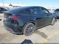 2023 Tesla Model Y — photo 4 of 20 | VIN 7SAYGDEF1PF914520