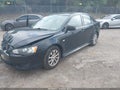 2011 Mitsubishi Lancer — photo 2 of 11 | VIN JA32U2FU4BU010043