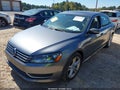 2014 Volkswagen Passat — photo 2 of 16 | VIN 1VWBH7A32EC011880