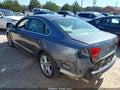 2014 Volkswagen Passat — photo 3 of 16 | VIN 1VWBH7A32EC011880