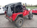 2004 Jeep Wrangler — photo 4 of 11 | VIN 1J4FA39S94P723317