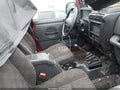 2004 Jeep Wrangler — photo 5 of 11 | VIN 1J4FA39S94P723317