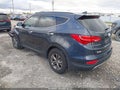 2015 Hyundai Santa Fe — photo 3 of 13 | VIN 5XYZU3LB5FG235815