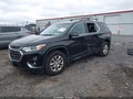 2018 Chevrolet Traverse — photo 2 of 16 | VIN 1GNEVGKW8JJ230177