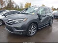 2016 Honda Pilot — photo 2 of 13 | VIN 5FNYF6H08GB016127