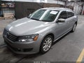2013 Volkswagen Passat — photo 2 of 16 | VIN 1VWBN7A36DC028611