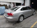 2013 Volkswagen Passat — photo 4 of 16 | VIN 1VWBN7A36DC028611