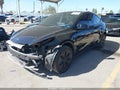 2023 Tesla Model Y — photo 2 of 18 | VIN 7SAYGDEE6PF899777