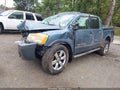 2011 Nissan Titan — photo 2 of 12 | VIN 1N6AA0EC2BN311792