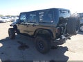 2012 Jeep Wrangler Unlimited — photo 3 of 17 | VIN 1C4HJWEG1CL215933