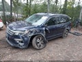 2018 Honda Pilot — photo 2 of 16 | VIN 5FNYF6H65JB032569