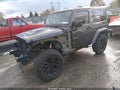 2017 Jeep Wrangler — photo 2 of 20 | VIN 1C4AJWBGXHL644646