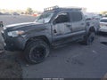 2021 Toyota Tacoma — photo 2 of 16 | VIN 3TMCZ5AN5MM378232