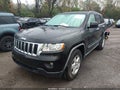 2011 Jeep Grand Cherokee — photo 2 of 16 | VIN 1J4RR4GG0BC506950