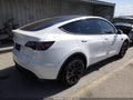 2023 Tesla Model Y — photo 4 of 15 | VIN 7SAYGDEE6PA156873