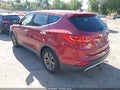 2016 Hyundai Santa Fe — photo 3 of 16 | VIN 5XYZT3LB7GG362277