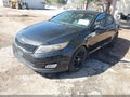 2015 Kia Optima — photo 2 of 11 | VIN 5XXGM4A75FG487922