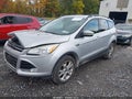 2013 Ford Escape — photo 2 of 16 | VIN 1FMCU9H91DUD82719