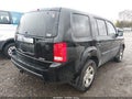 2011 Honda Pilot — photo 4 of 11 | VIN 5FNYF4H28BB046033