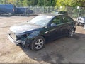2015 Chevrolet Cruze — photo 2 of 16 | VIN 1G1PC5SB6F7192874