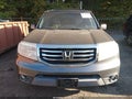 2012 Honda Pilot — photo 12 of 16 | VIN 5FNYF4H55CB019948