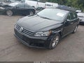 2016 Volkswagen Passat — photo 2 of 15 | VIN 1VWAT7A39GC019956