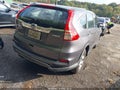 2015 Honda CR-V — photo 4 of 16 | VIN 5J6RM4H35FL023924