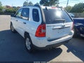 2010 Kia Sportage — photo 3 of 11 | VIN KNDKG3A3XA7726634