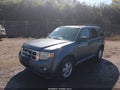 2010 Ford Escape — photo 2 of 11 | VIN 1FMCU9DG8AKC06150