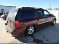 2006 GMC Envoy — photo 4 of 12 | VIN 1GKET16S466122026