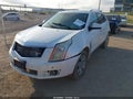 2015 Cadillac SRX — photo 2 of 17 | VIN 3GYFNDE34FS546446